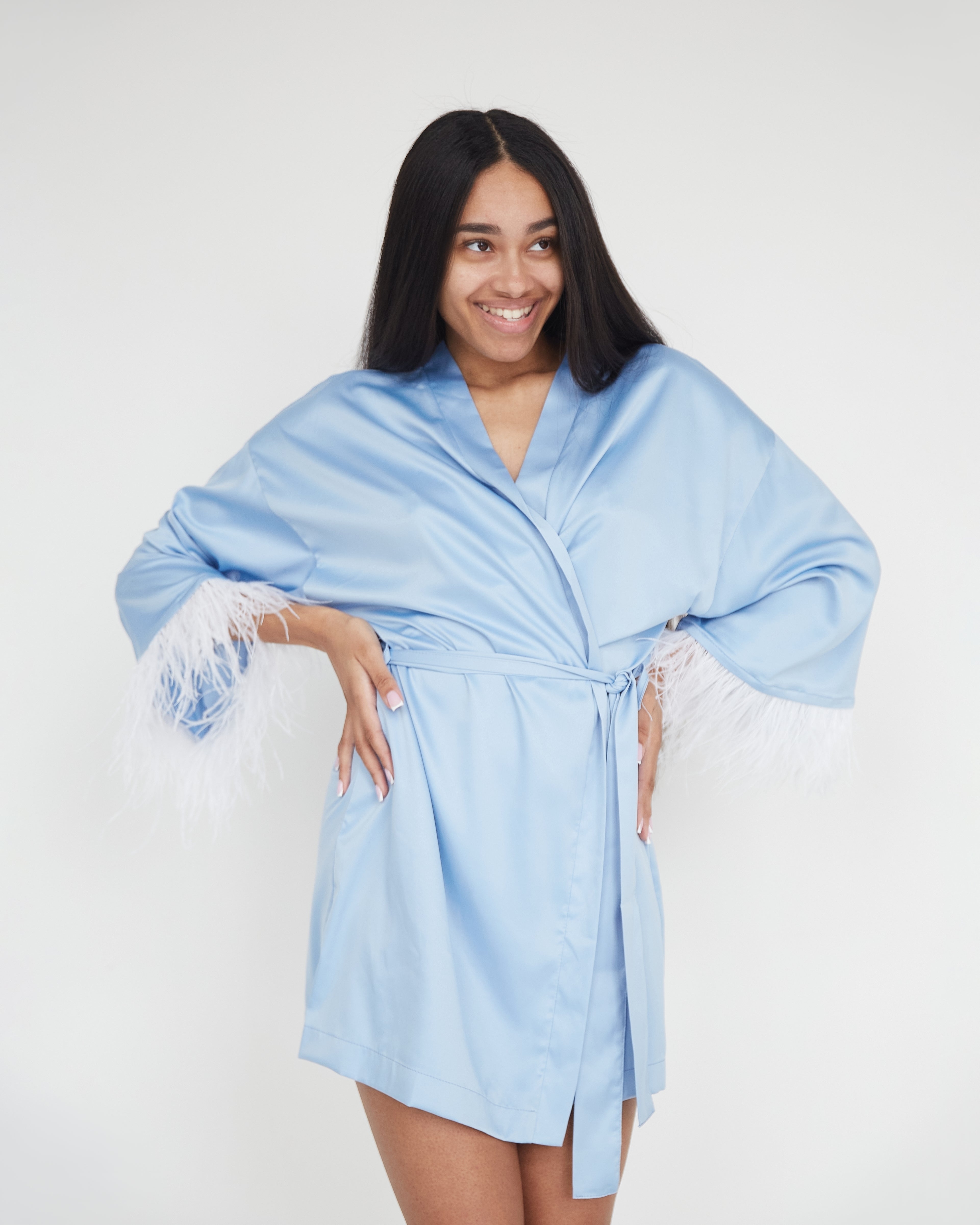 Silk light blue wedding day robe with feather for stylish bride and bridesmaids