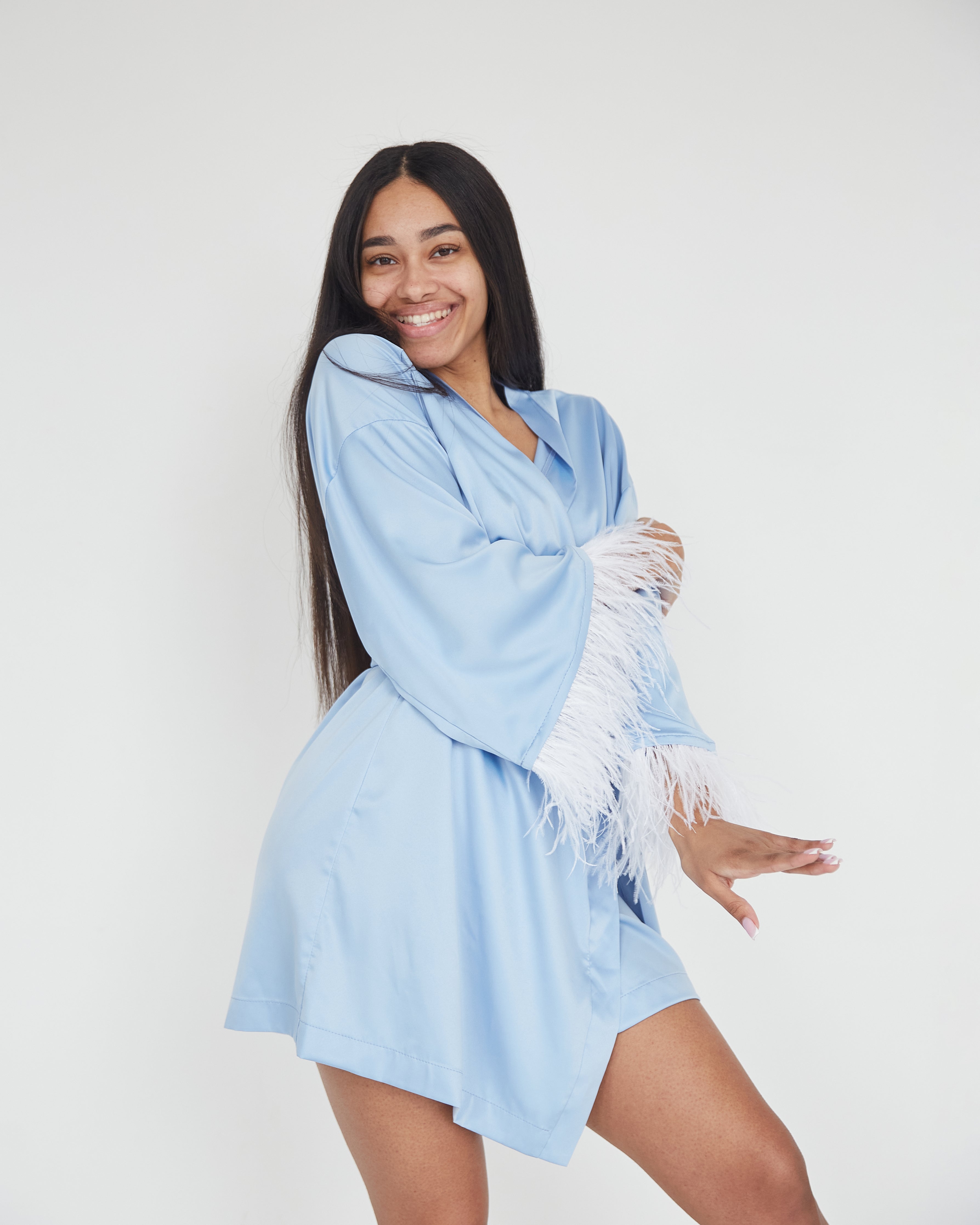 Silk light blue wedding day robe with feather for stylish bride and bridesmaids
