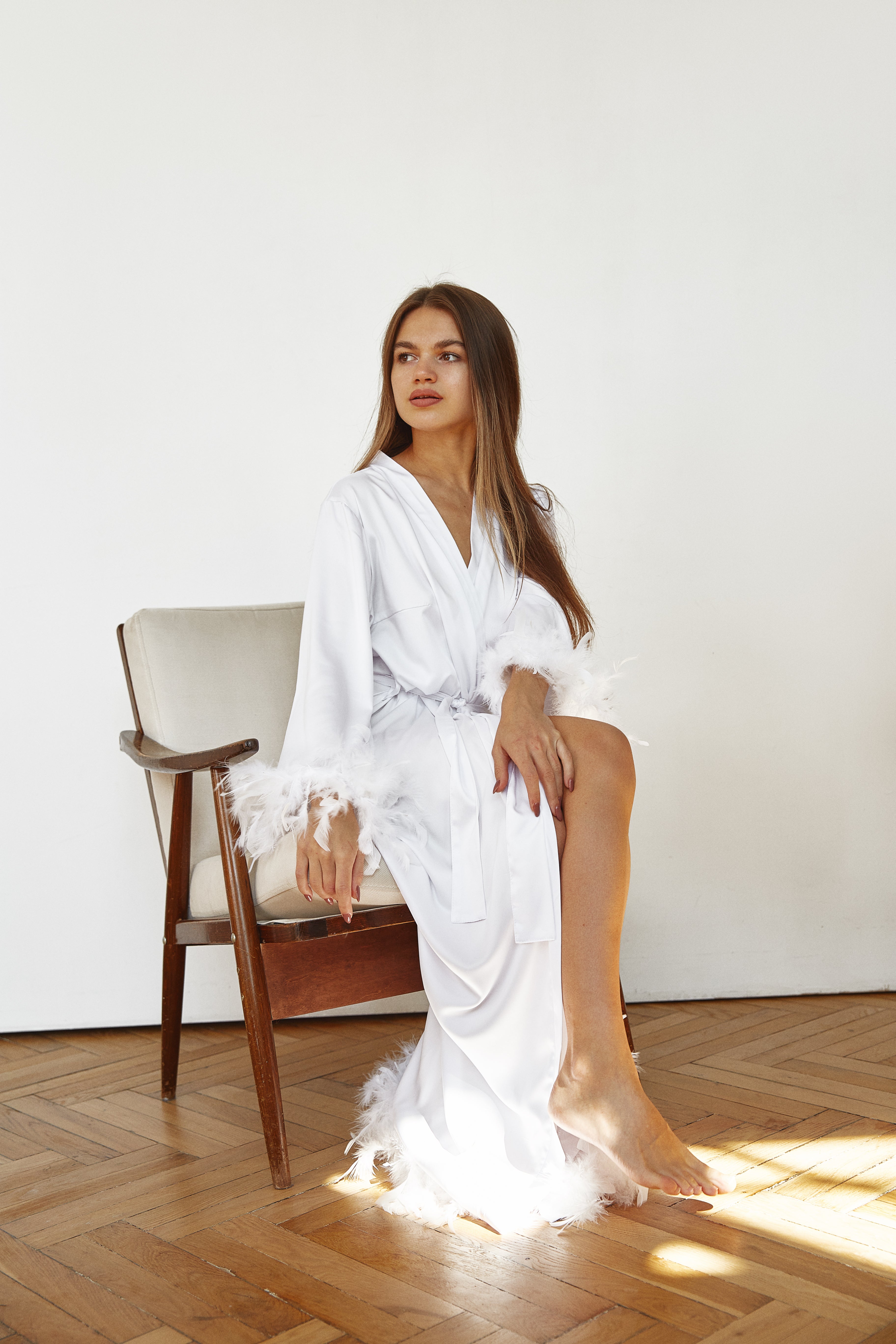 Feather trim bridal robe as bachelorette party dressing gown